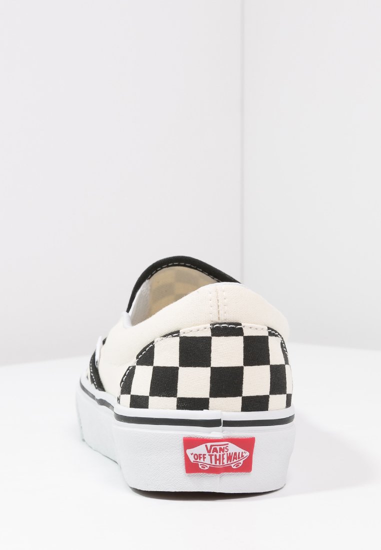 vans slip on shoes black and white